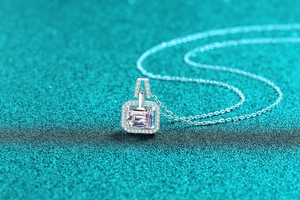 Detail of S925 sterling silver necklace with a radiant rectangular moissanite pendant