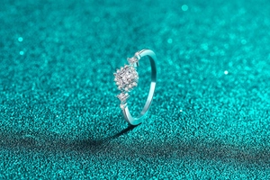 Macro detail of S925 silver ring featuring a square moissanite cluster in an elegant design