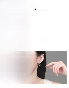 Detailed view of S925 sterling silver moissanite tassel earrings with pear-shaped drops