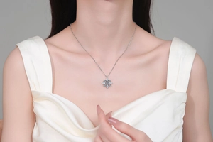 Macro detail of luxurious S925 silver necklace with marquise moissanite snowflake pendant