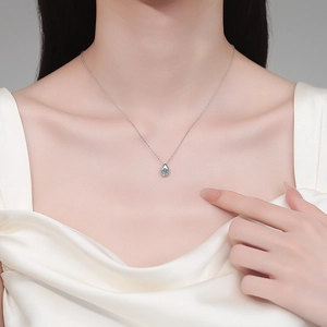 Elegant S925 sterling silver water drop necklace with light blue moissanite pendant