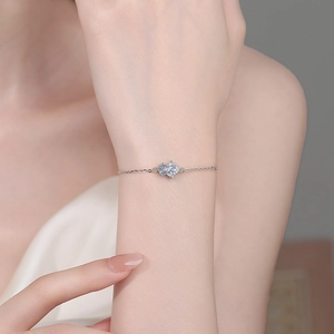 Elegant 925 sterling silver bracelet with sparkling square moissanite stones on wrist