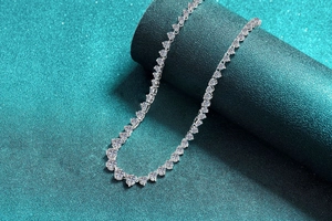 Macro shot of S925 sterling silver tennis necklace with sparkling moissanite stones
