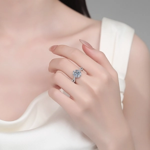 Exquisite S925 silver moissanite ring with halo setting and twisted pave band on hand