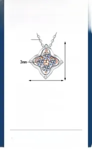 Macro detail of S925 silver four-leaf clover pendant with 3mm moissanite stones
