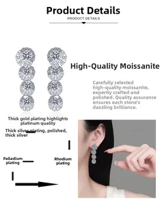 Detail of luxury moissanite drop earrings with multi-layer plating and platinum finish