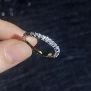 Sparkling S925 sterling silver eternity ring featuring full moissanite diamond setting