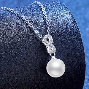 Elegant S925 silver infinity necklace featuring a large round pearl and pavé crystals