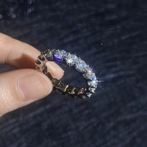 Sparkling S925 sterling silver eternity ring with moissanite pave setting for women and men