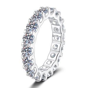S925 sterling silver eternity ring with sparkling moissanite stones on a white background
