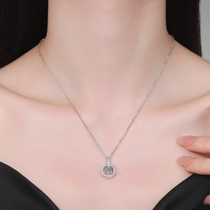 Elegant S925 sterling silver star-orbit pendant necklace with moissanite on model