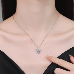 S925 sterling silver bee pendant necklace with moissanite sparkle on elegant model