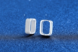 Detailed close-up of square s925 silver hoop earrings with pavé set moissanite stones