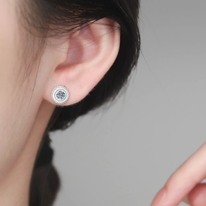 Boucles d'oreilles vintage en argent 925 avec moissanite et texture tissée torsadée