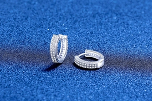 Detailed macro view of S925 sterling silver hoop earrings with full pavé moissanite