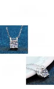 Macro detail of round moissanite pendant with silver four-prong setting and classic chain