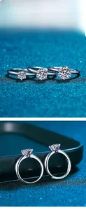 Detail view of 925 sterling silver six-prong setting rings showing various moissanite sizes