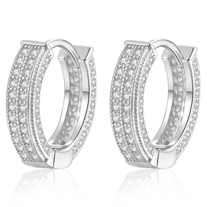 Elegant S925 sterling silver hoop earrings with shimmering moissanite stones on white background