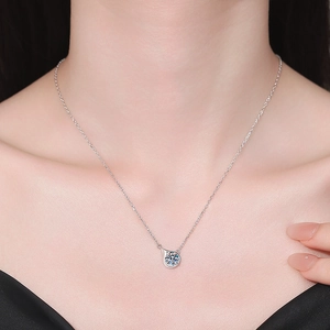 Elegant S925 sterling silver necklace with 1 carat moissanite pendant worn by model