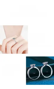Detailed view of six-prong moissanite setting and polished 925 sterling silver band