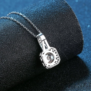 Princess cut s925 silver moissanite necklace with black micro-pave frame on dark surface