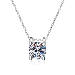 Classic round moissanite pendant necklace with four-prong silver chain for women
