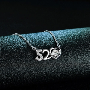 Macro view of 925 sterling silver heart necklace with 520 pendant and moissanite stone