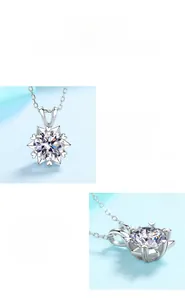 Détail macro du pendentif flocon en moissanite sur monture en argent sterling S925 poli