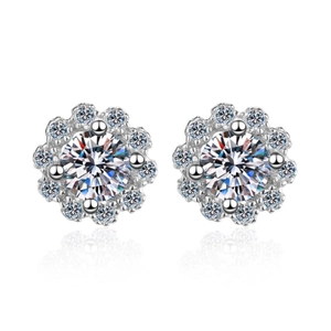 Sparkling Moissanite flower stud earrings in 925 sterling silver with a mirror reflection