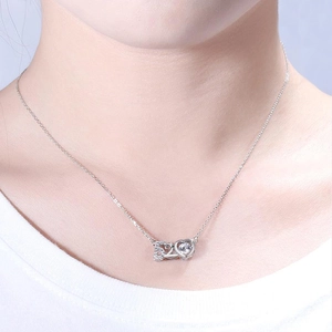 Elegant 925 silver 520 heart necklace with moissanite dancing stone on model