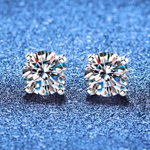 Close-up of S925 sterling silver stud earrings with round-cut stone and four-prong setting