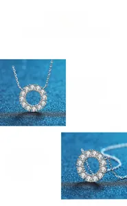 Détail macro du pendentif moissanite halo rond avec sertissage en argent poli