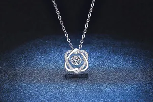 Macro shot of S925 silver heart pendant with dancing moissanite stone and pave accents