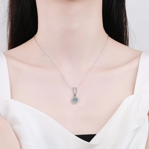 S925 sterling silver snowflake necklace with moissanite pendant worn by model
