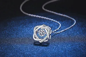 Macro detail of S925 silver double heart pendant with sparkling moissanite main stone