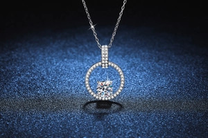 Detailed macro of S925 silver halo pendant with 1 carat moissanite and pave stones