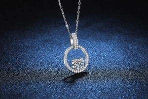Macro shot of S925 silver halo pendant with brilliant moissanite stone on blue background