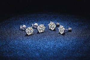 Macro detail of six-prong S925 silver stud earrings with classic and screw back options