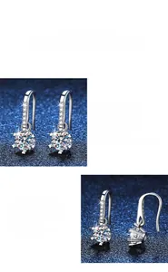Macro detail of S925 silver snowflake earrings with D color moissanite in six-prong setting