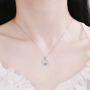 S925 sterling silver necklace featuring 1 carat moissanite halo pendant on female model