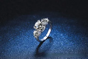 Macro side view of luxury s925 silver three-stone ring with 3 carat moissanite stones