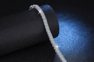 Close-up of S925 sterling silver tennis bracelet with brilliant moissanite stone inlay