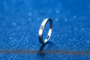 Macro view of princess cut moissanite set in a minimalist s925 silver band