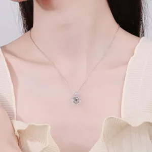 Elegant S925 sterling silver necklace featuring a dancing moissanite halo pendant on model