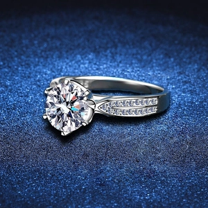 Elegant six-prong S925 sterling silver moissanite ring with split shank and pavé stones