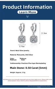 Macro shot of S925 sterling silver halo earrings with 0.5ct Moissanite center stones