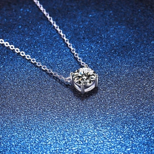 Classic S925 sterling silver necklace with a 1-carat round moissanite in four-prong setting
