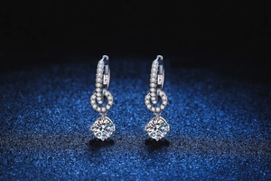 Macro shot of S925 sterling silver hoop earrings with brilliant-cut round moissanite