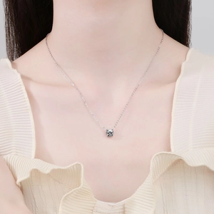 Classic S925 sterling silver necklace with 1 carat moissanite pendant on female model