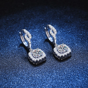 S925 sterling silver drop earrings featuring square-framed moissanite stones on dark blue background
